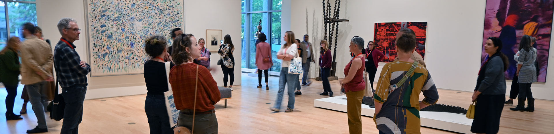 Dennos Museum Center patrons browse artwork in one of the museum's galleries