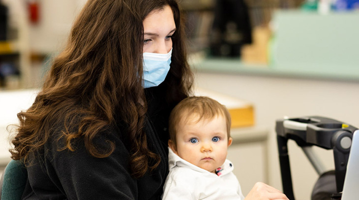 NMC Visual Communications program student Gabby Edgcombe and her daughter