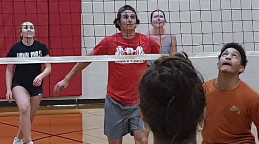 Ratio Christi students playing volleyball